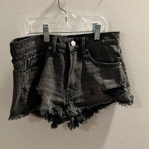 black distressed jean shorts, frayed at the bottom